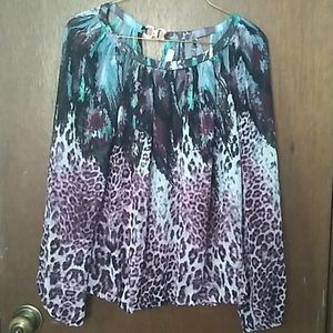 Jennifer Lopez animal print blouse